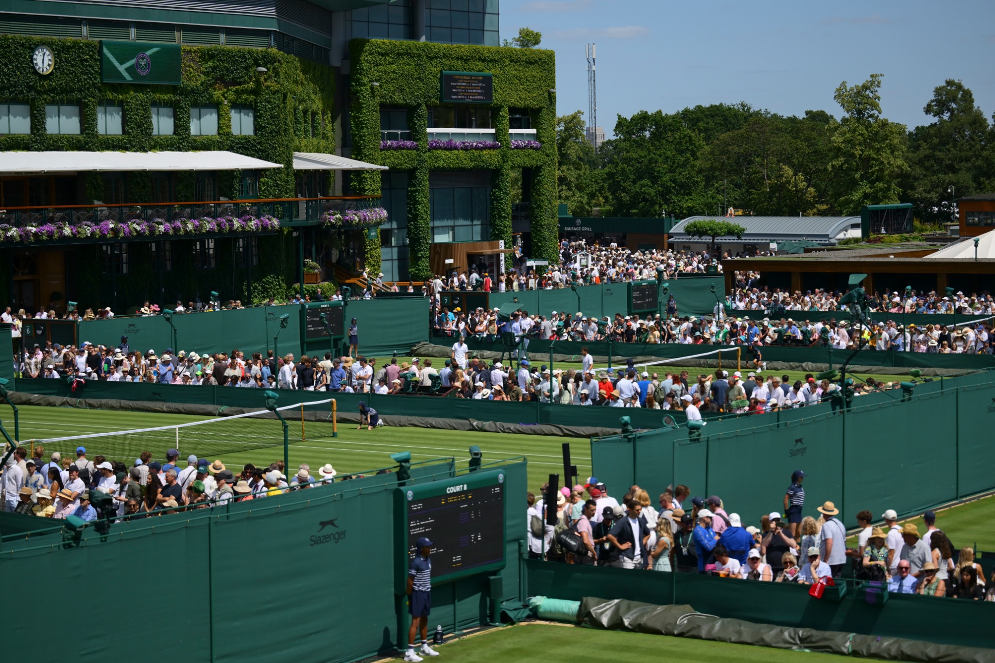 The outside courts and crowds at Wimbledon